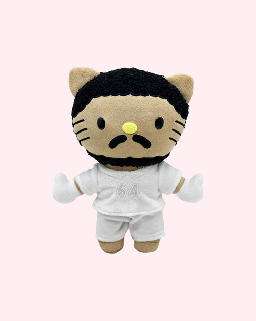 Front view of Bad Bunny Hello Kitty plush in a white number 64 jersey and matching shorts on a pale pink background.