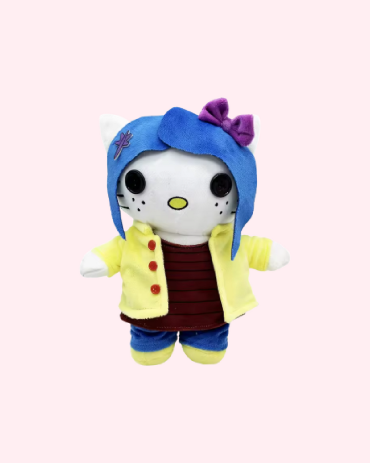 Front view of Coraline Hello Kitty plush with blue hair, a purple bow and a yellow raincoat, on a pale pink background.