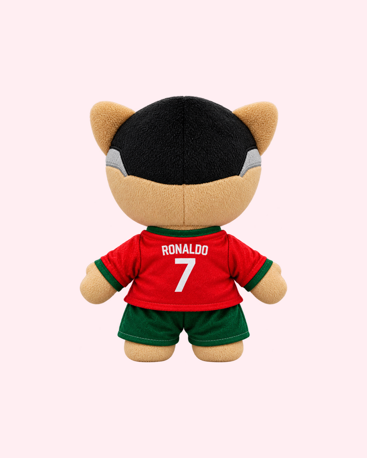 Back view of Cristiano Ronaldo Hello Kitty plush showing Ronaldo and number 7 on the red Portugal shirt, on a pale pink background.