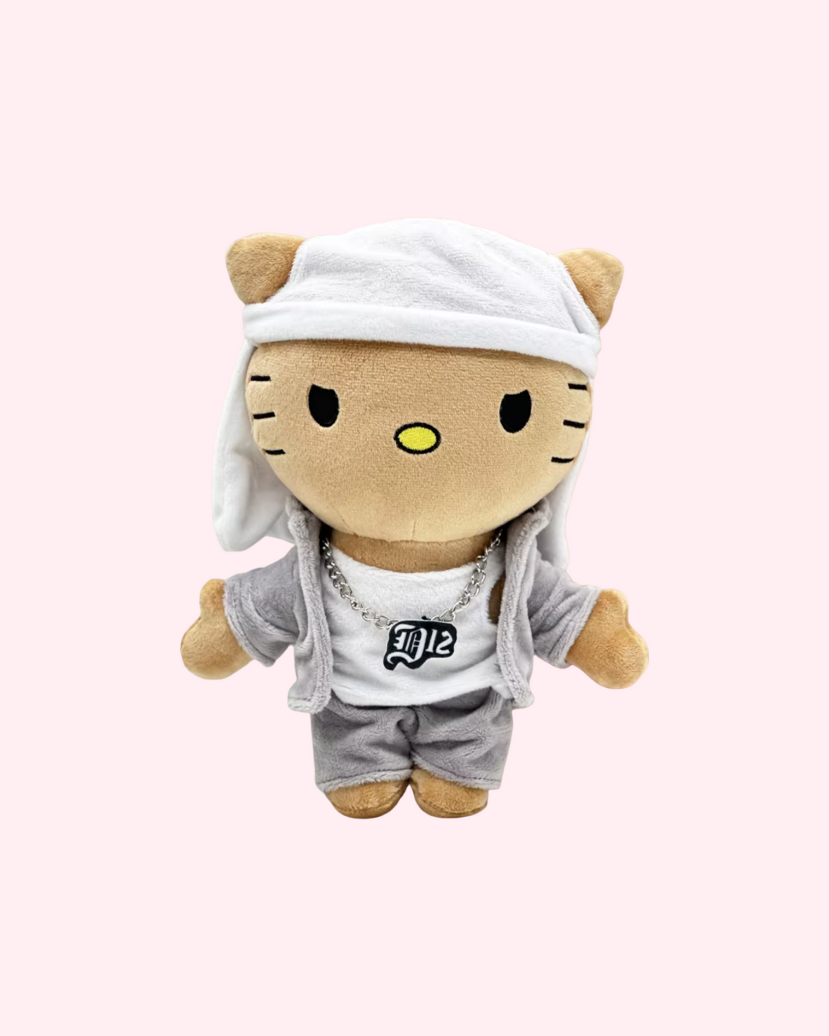 Front view of Eminem Hello Kitty plush with a white head wrap, a gray outfit and a printed white shirt, on a pale pink background.