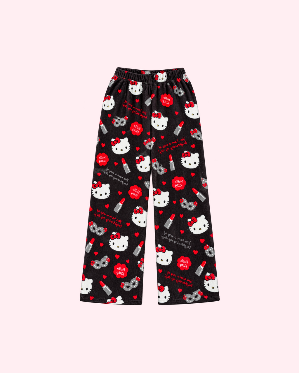 Mirrored back view of black Hello Kitty pajama pants with red lipstick tubes, bows, hearts and gray eye-mask motifs