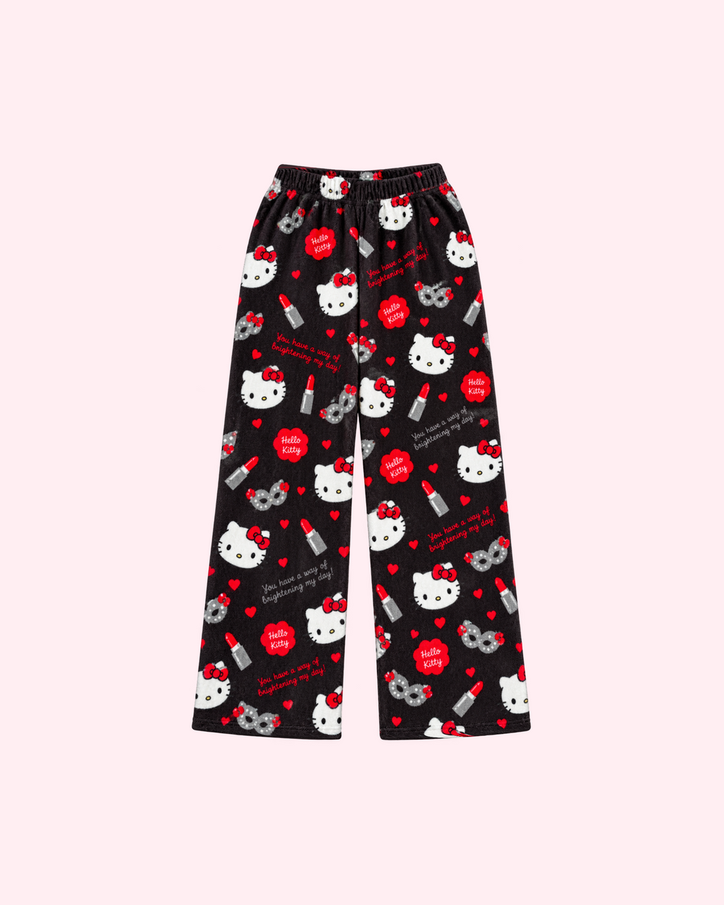 Front view of black Hello Kitty pajama pants with red lipstick tubes, bows, hearts and gray eye-mask motifs
