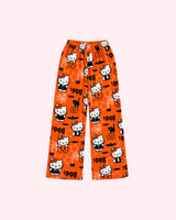 Back view of orange Hello Kitty Halloween pajama pants with pumpkins, bats and BOO lettering