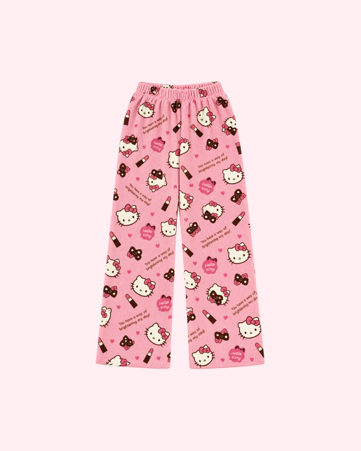Front view of pink Hello Kitty pajama pants with lipstick tubes, bows, hearts and eye-mask motifs