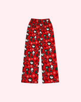 Back view of red Hello Kitty Christmas pajama pants with green trees, gifts and candy canes