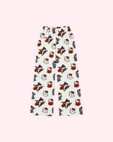 Front view of white Hello Kitty Halloween pajama pants with witches, pumpkins, ghosts and mummies