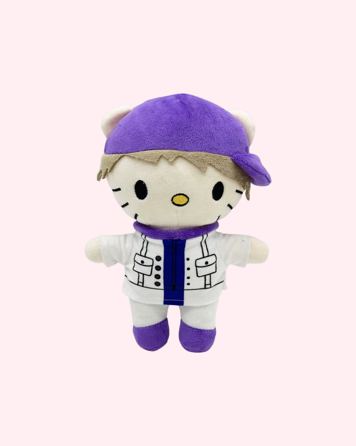Front view of Justin Bieber Hello Kitty plush with a purple cap and a white-and-purple outfit, on a pale pink background.