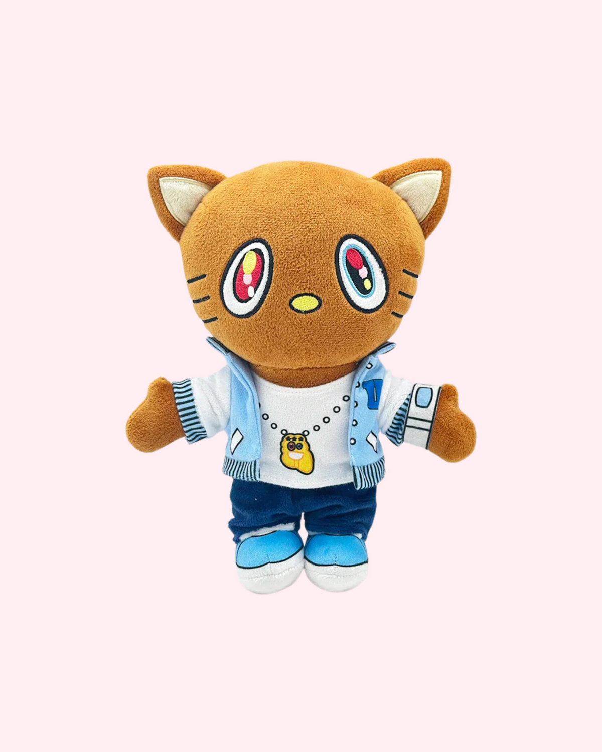 Front view of Kanye West Hello Kitty plush with multicolored embroidered eyes and a blue-and-white varsity outfit, on a pale pink background.