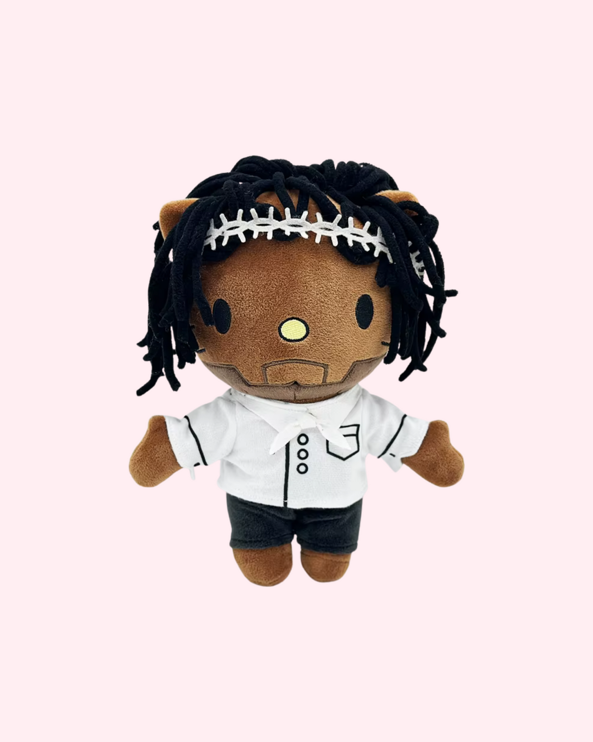 Front view of Kendrick Lamar Hello Kitty plush with dark yarn hair, a silver headband, a white shirt and black shorts, on a pale pink background.