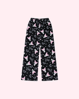 Mirrored back view of black Kuromi pajama pants with pink character details, hearts and Kuromi lettering