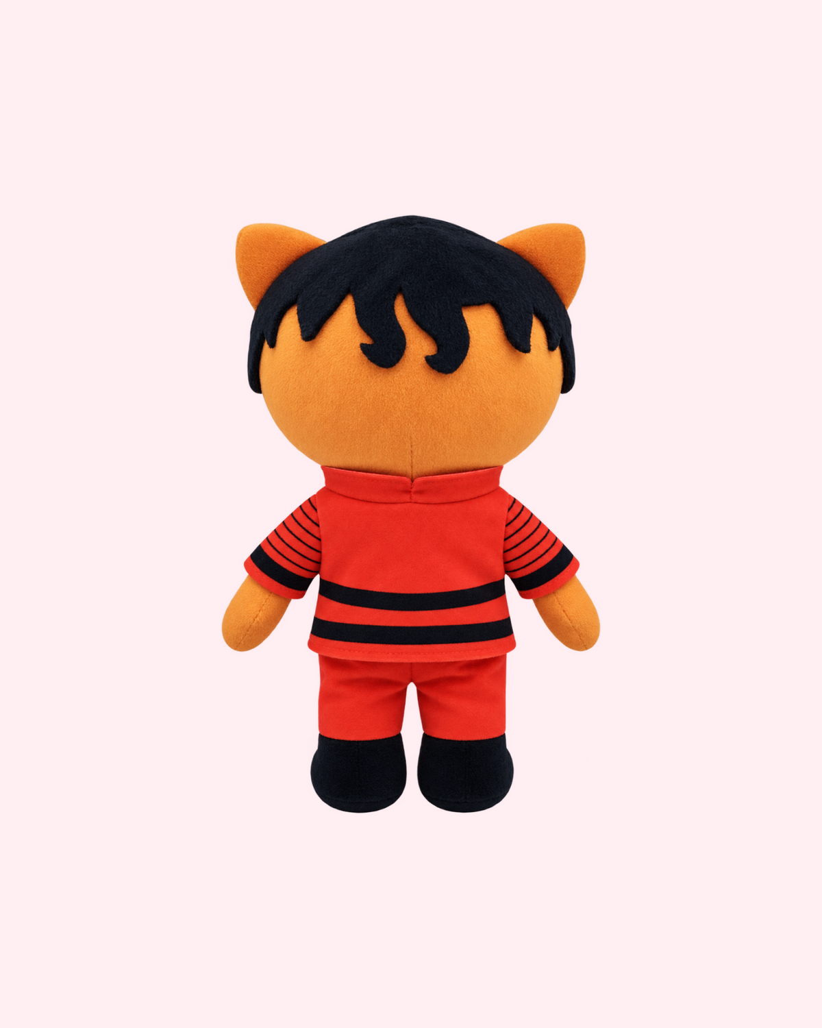 Back view of Michael Jackson Hello Kitty plush with black felt hair and a red stage outfit with black trim, on a pale pink background.