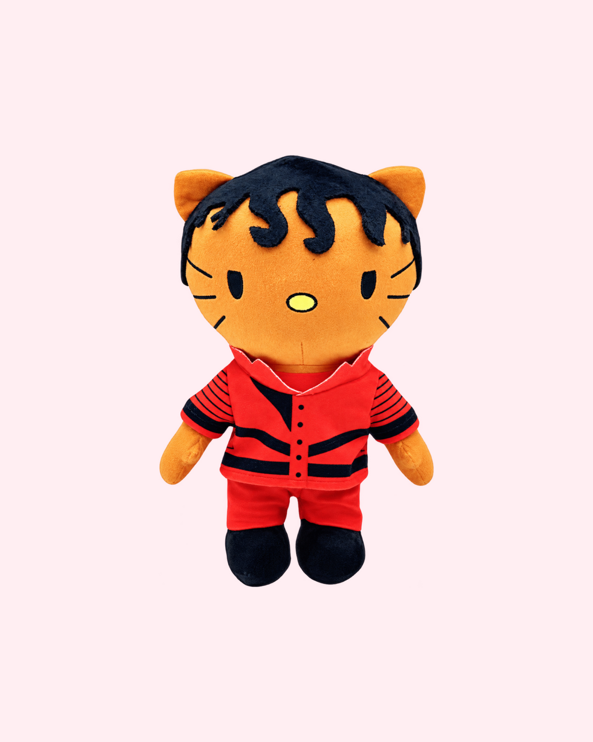 Front view of Michael Jackson Hello Kitty plush with curly black felt hair and a red stage outfit with black trim, on a pale pink background.