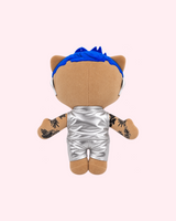 Back view of Rauw Alejandro Hello Kitty plush showing blue hair and a silver outfit on a pale pink background.