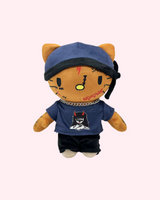 Front view of Ski Mask The Slump God Hello Kitty plush with a blue cap, black bandana and dark graphic tee on a pale pink background.