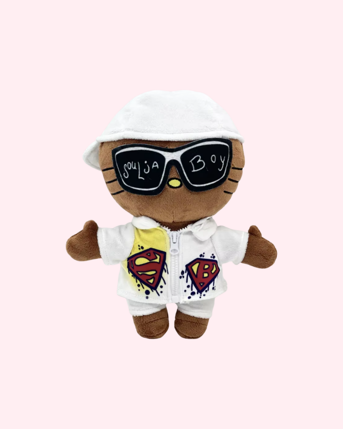 Front view of Soulja Boy Hello Kitty plush with a white cap, oversized sunglasses and a graphic white outfit on a pale pink background.