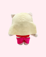 Back view of Taylor Swift Hello Kitty plush showing blonde hair and pink shorts on a pale pink background.
