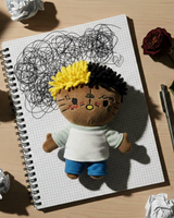 XXXTentacion Hello Kitty plush on an open notebook beside a pen and a rose.